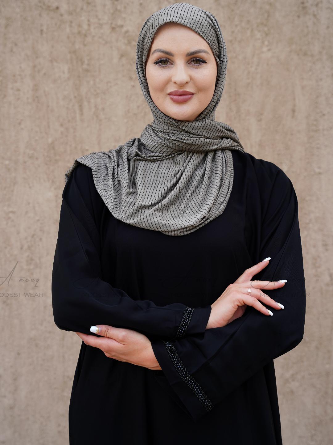 Elegant black abaya with crystal sleeves for modest fashion