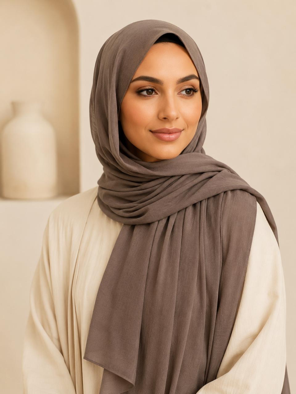 Model wearing mocha premium modal hijab in soft taupe brown shade